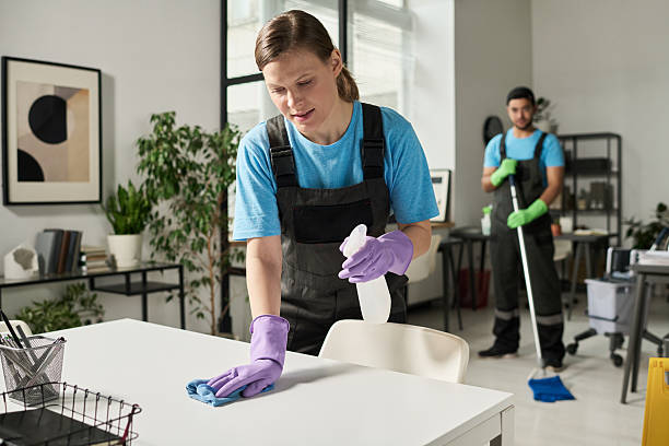 istock Cleaning Worker Wiping Dust In Office 2212214930