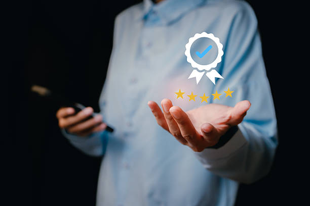 istock Professional Hands Holding Award Icon with Verified Check Symbol, business concept 2212215513
