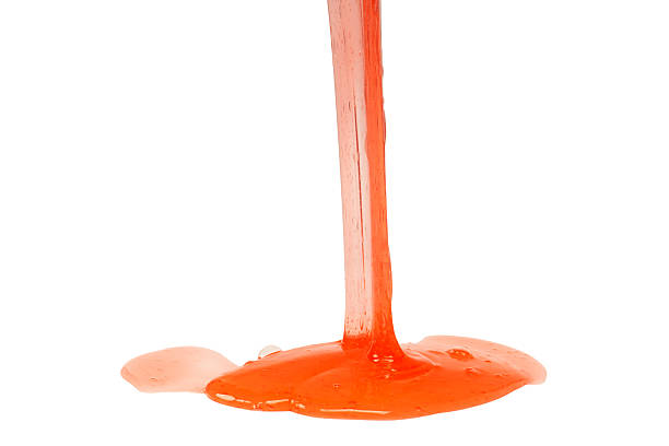 istock Red slime toy isolated on a white background. 2212223324