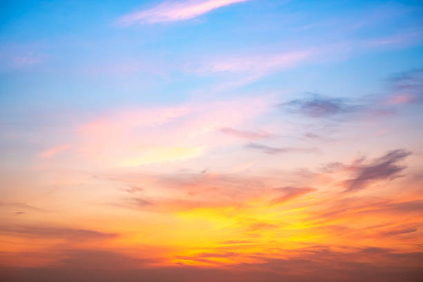 istock Beautiful , luxury soft gradient orange gold clouds and sunlight on the blue sky perfect for the background, take in evening,Twilight, Large size, high definition landscape photo 2212224061