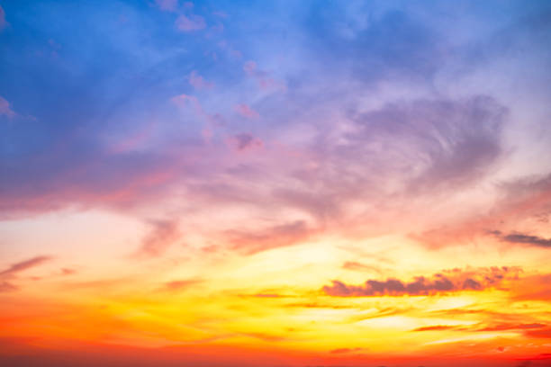 istock Beautiful , luxury soft gradient orange gold clouds and sunlight on the blue sky perfect for the background, take in evening,Twilight, Large size, high definition landscape photo 2212224082
