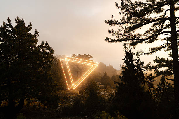 istock Striking Neon Triangle in the Forest 2212225240