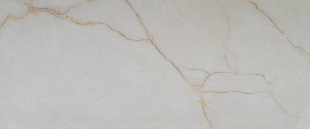 istock Soft beige marble with elegant gold lines 2212225243