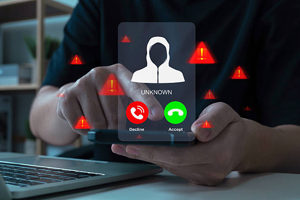 istock Cybersecurity. people hand using mobile phone with warning messages icon alert, virus protection software, cyber, business finance, malware attack warning, internet network technology concept 2212237054