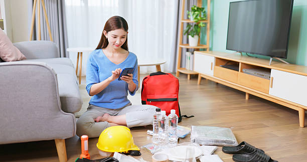 istock asian woman Emergency Kit Prep 2212238889
