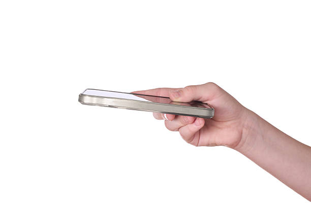 Smartphone in hand on white background stock photo