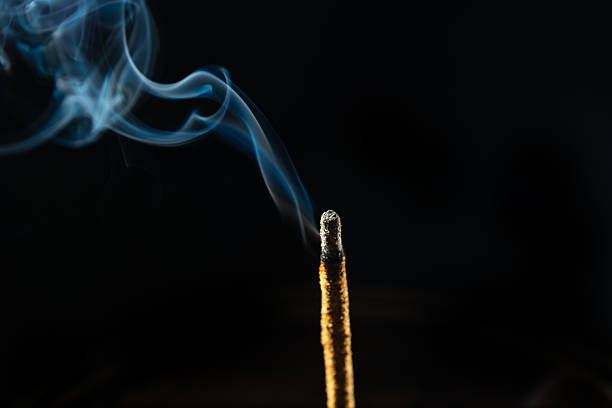 istock Abstract swirling incense smoke in soft blue tones. 2212243028
