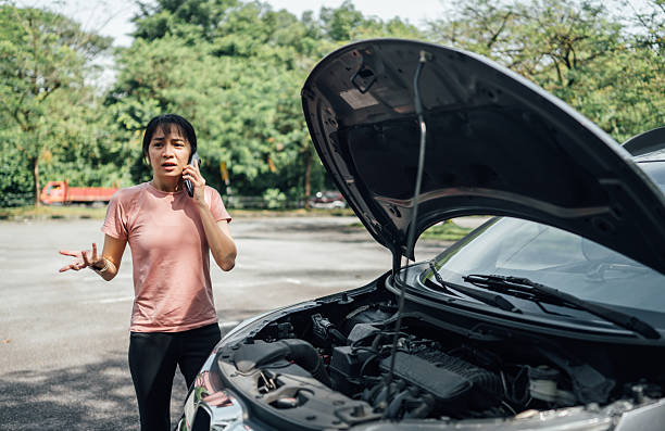 istock woman calling road assistance 2212255051