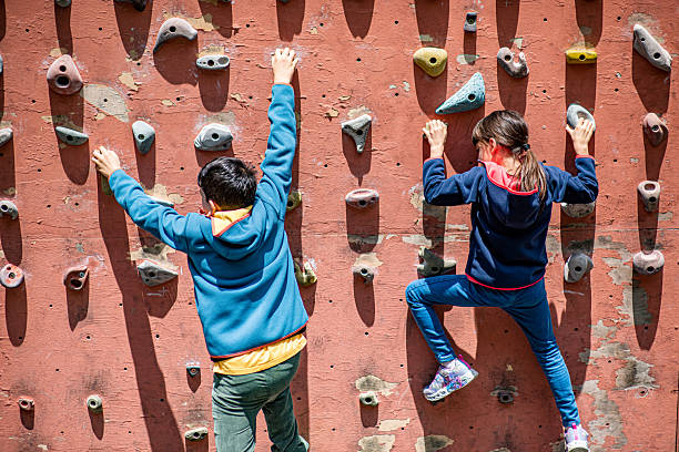 Children climbing the climbing track