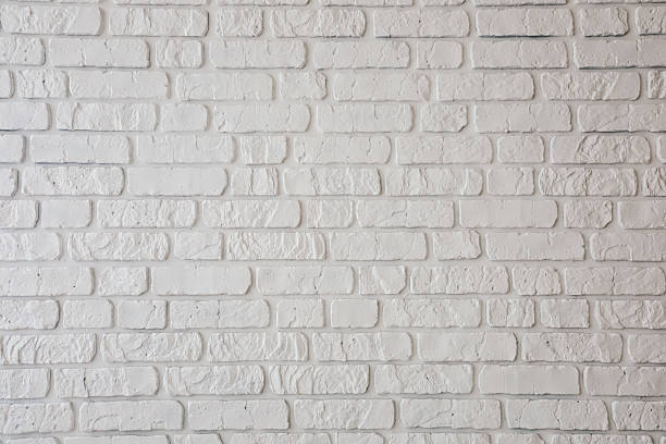 istock Bright interior with a white textured brick wall provides a clean modern backdrop for decor 2212263625