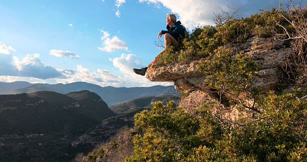 istock Hiker on edge of mountain, Liguria 2212265556