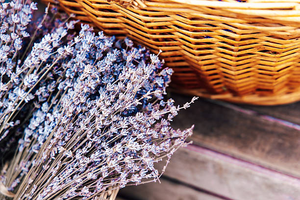 istock Lavender bundles arranged next to a woven basket in a rustic setting 2212265673