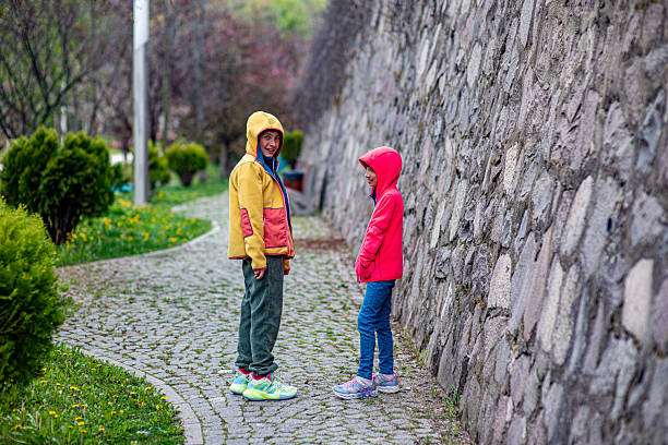 Children chatting in a city park