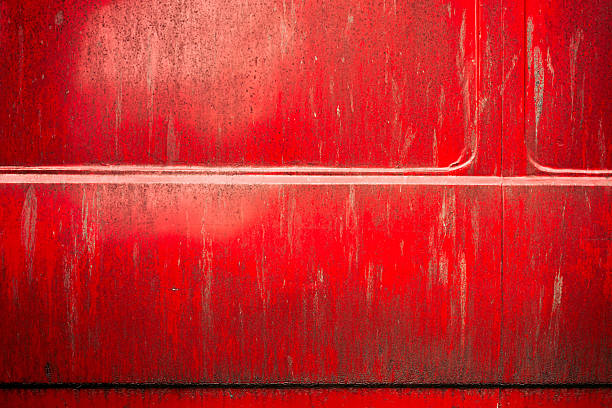 istock Dry mud dirt stains on red metallic surface of a car 2212273808