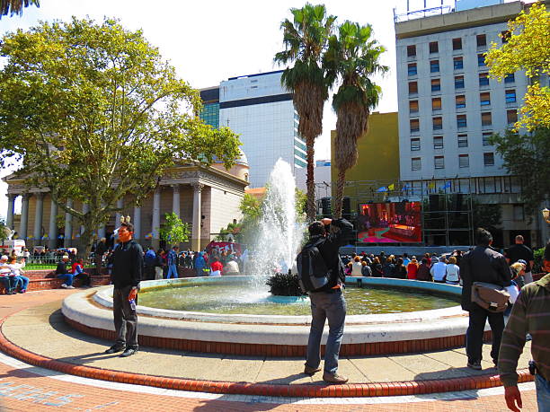 Buenos Aires, Argentina - 03.17.2013 The Plaza de Mayo (May Square) .People near of the Metropolitan Cathedral in Buenos aires city.  Pope Conclave's. People waiting for Pope election conclave in Sistine Chapel in Plaza de Mayo Square  after the Cardinal vote for a new Pope. It is a day of the Conclave to elect a Pope Francesco.