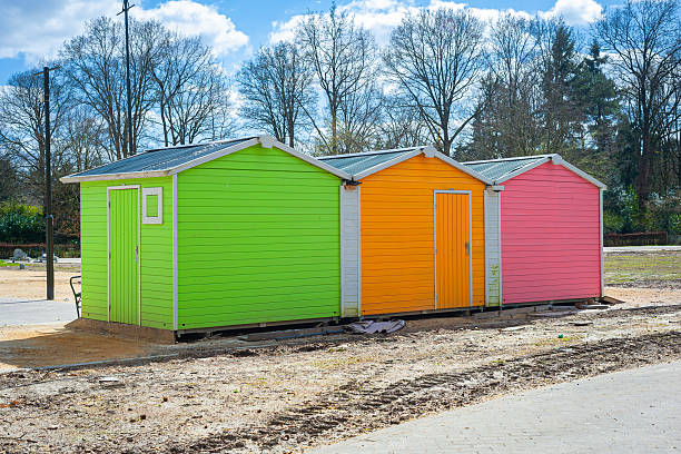istock Cabins painted in bright italian ice colors 2212279244