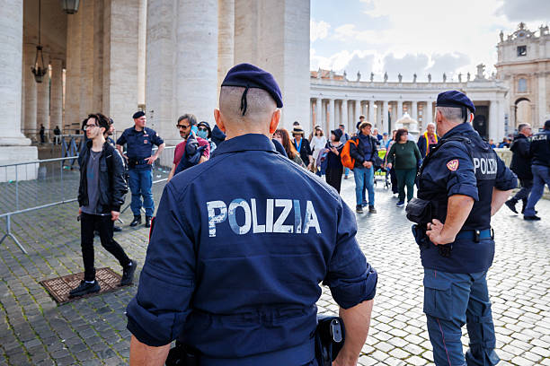 Vatican City, Vatican - April 25, 2025: State Police officers provide security during the funeral ceremony of Pope Francis in St. Peter's Square.