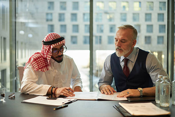 istock Two Diverse Men Coworking In Modern Office 2212287455