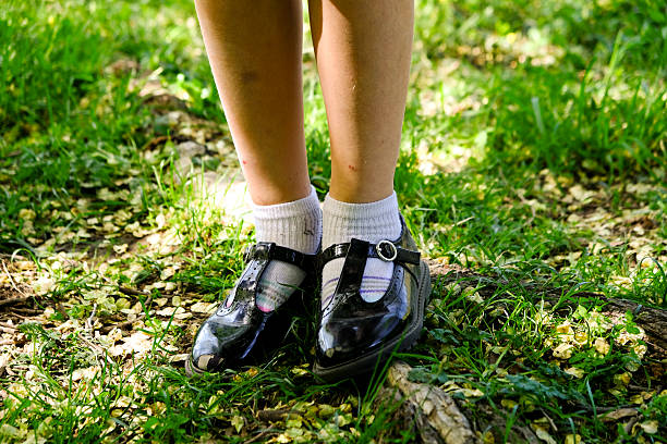 Little girl's feet in spring