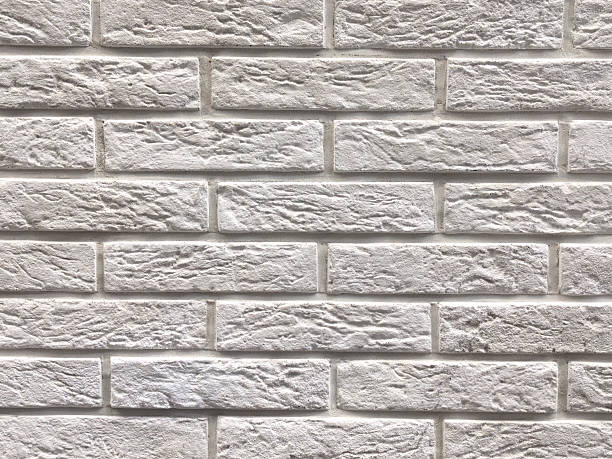 istock Textured wall made of bricks close-up 2212292466