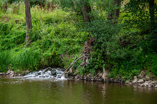 Mini waterfall in the rustic village of Esneux , Liège Belgium