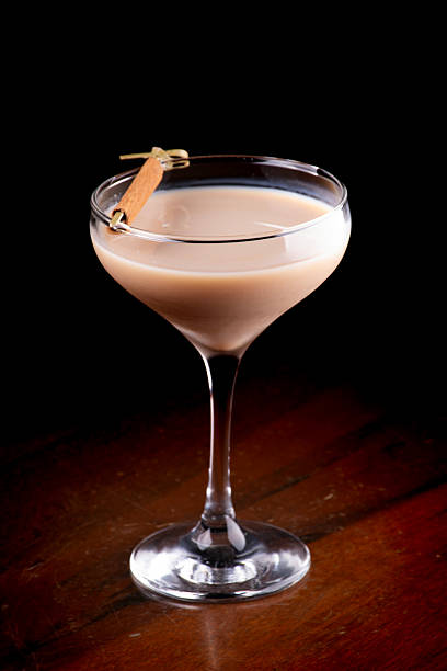 istock marula milk liqueur cocktail with cinnamon isolated on wooden table 2212297469