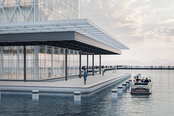 istock Business people towards modern office lakeside building 2212301552