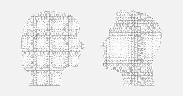istock Head woman and man made puzzle pieces, education 2212306141