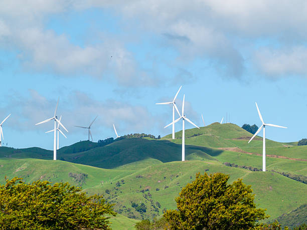 istock White wind turbines over rural hills 2212313266