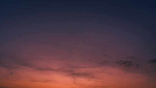 istock Twilight sky backgrounds, Evening sky with colorful red, orange, purple sunset clouds on dark blue sunlight, Dusk sky summer 2212317227