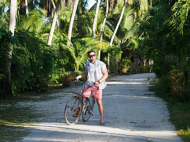 istock Handsome man with vintage bicycle. Clear, sunny day 2212318001