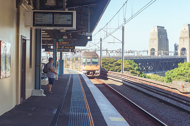 Sydney, Australia, April 18, 2025- People waiting for a train at the Milsons Point train station.