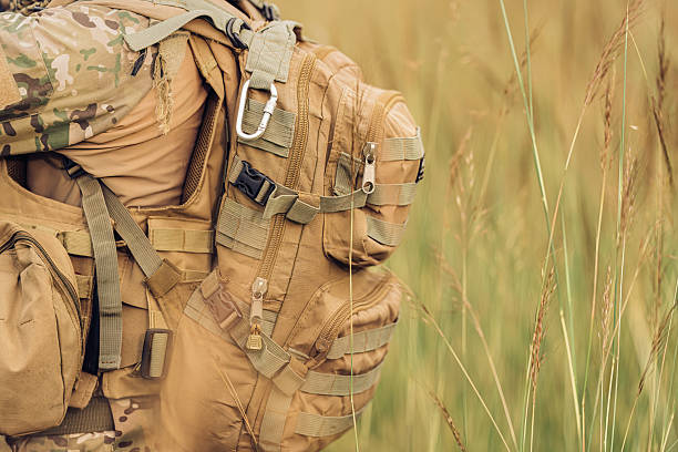 istock Behind the soldier's calm and focused expression lies a mind analyzing every sound and shadow, always alert, always ready to defend and complete his objective. 2212322960