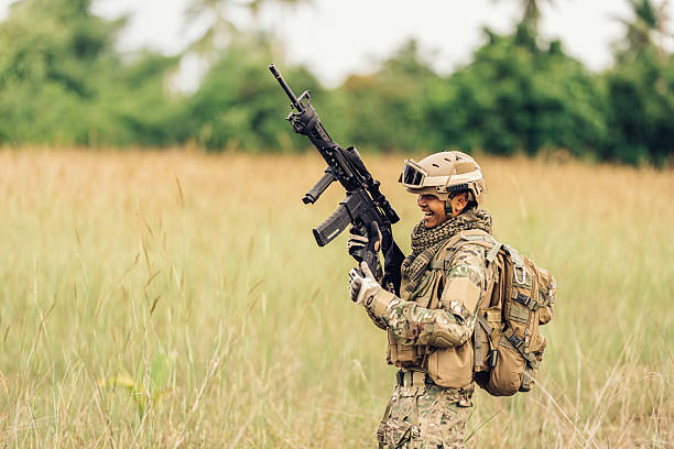 istock Soldiers survey their surroundings, breathing evenly while taking precise aim, demonstrating the discipline and determination that an intense mission requires. 2212322966