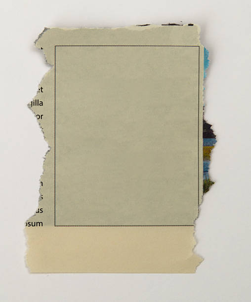 istock Piece of newspaper on white background 2212326011