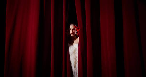 istock A woman in the theater 2212327942