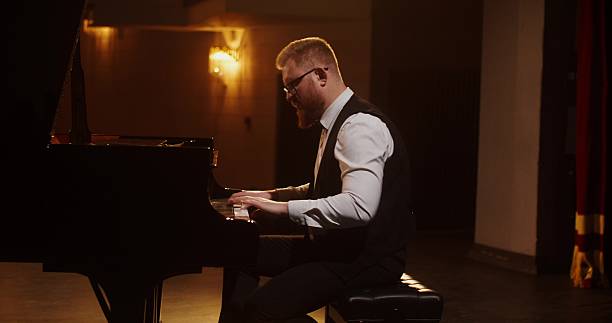 istock A musician plays the piano 2212328481