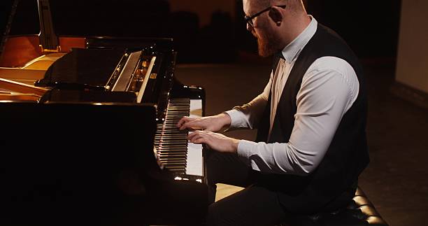 istock A musician plays the piano 2212328505