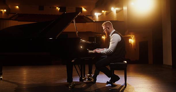 istock A musician plays the piano 2212328549