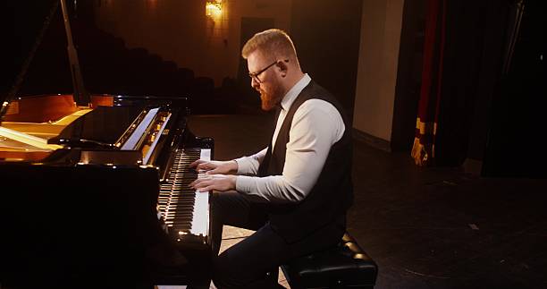 istock A musician plays the piano 2212328560