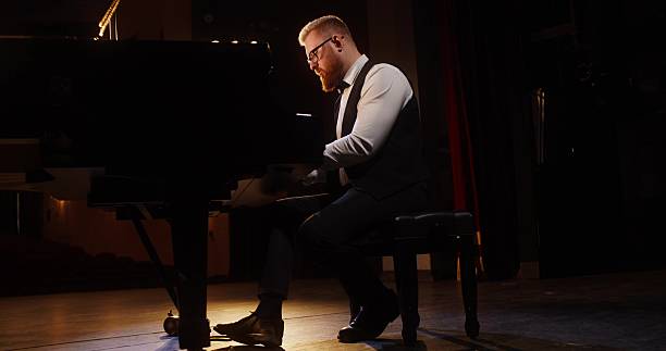 istock A musician plays the piano 2212328565