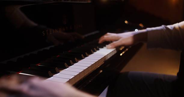 istock A musician plays the piano 2212328576