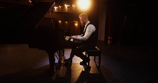 istock A musician plays the piano 2212328602