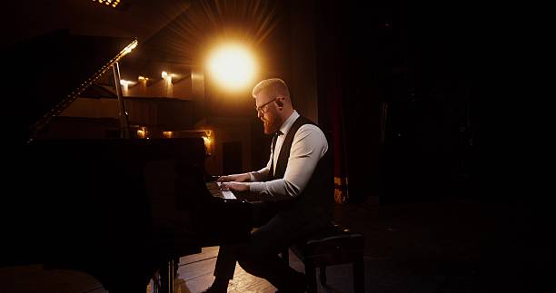 istock A musician plays the piano 2212328617