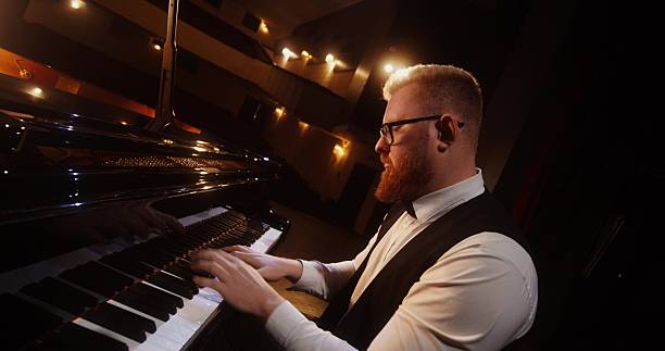 istock A musician plays the piano 2212328629