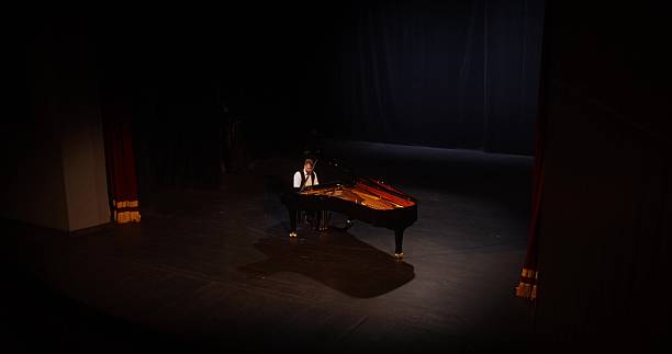 istock A musician plays the piano 2212328686