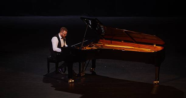 istock A musician plays the piano 2212328694