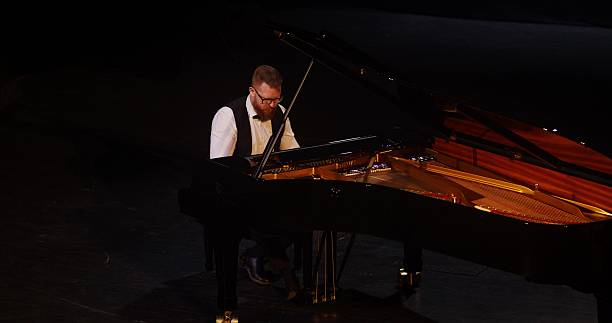 istock A musician plays the piano 2212328703
