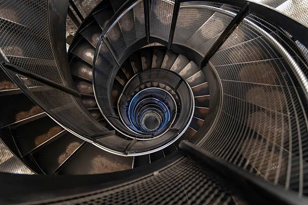istock Abstract view of modern spiral staircase 2212329326