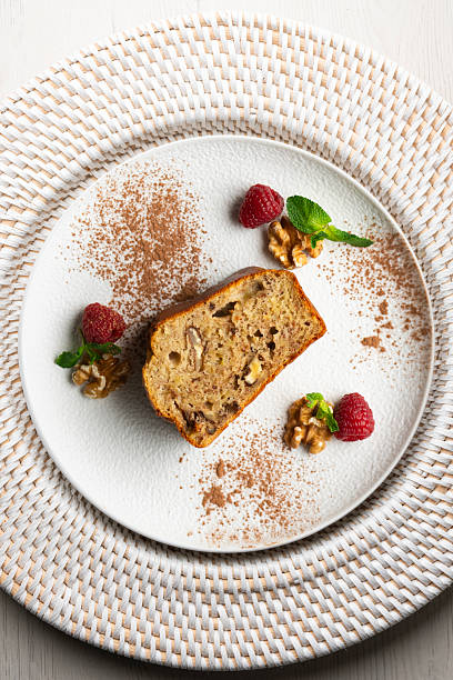Banana bread Ripe banana cake with walnuts. Top view table.